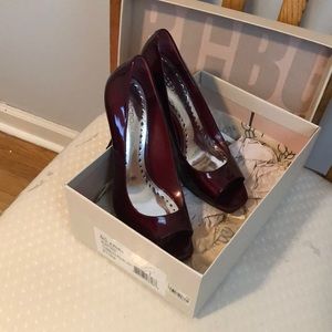 Ruby red peep toe heels